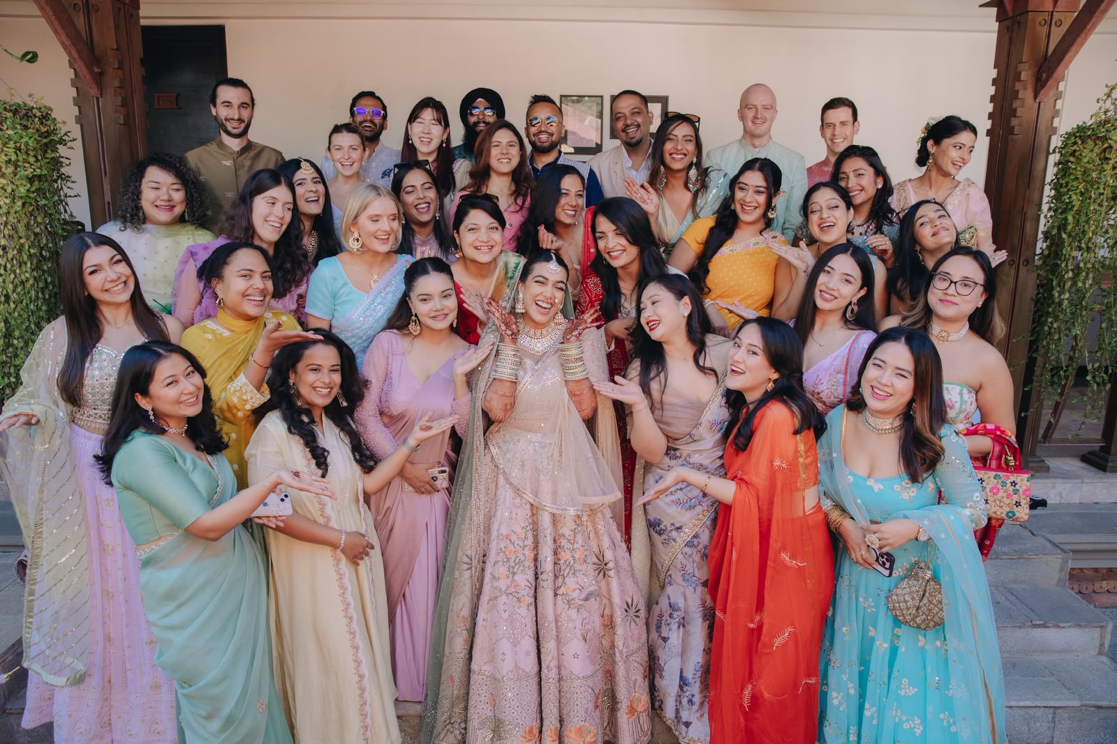 Ankshita surrounded by her friends in pastel outfits
