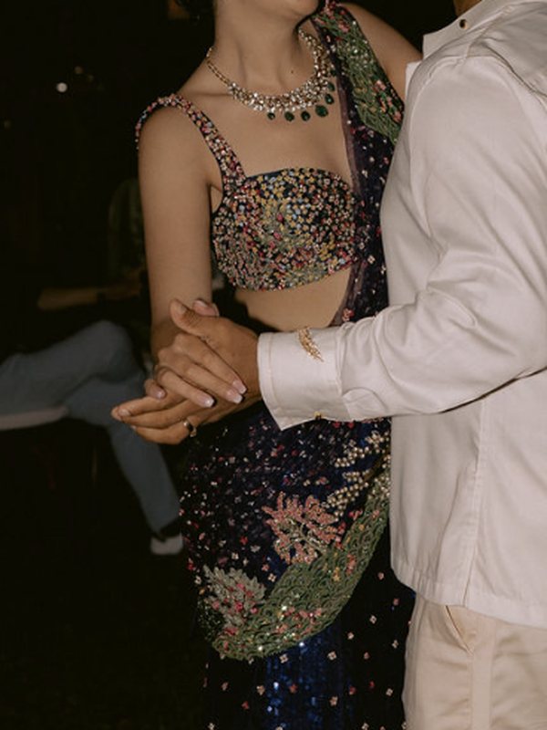 Shaibyaa dancing in her blue reception outfit