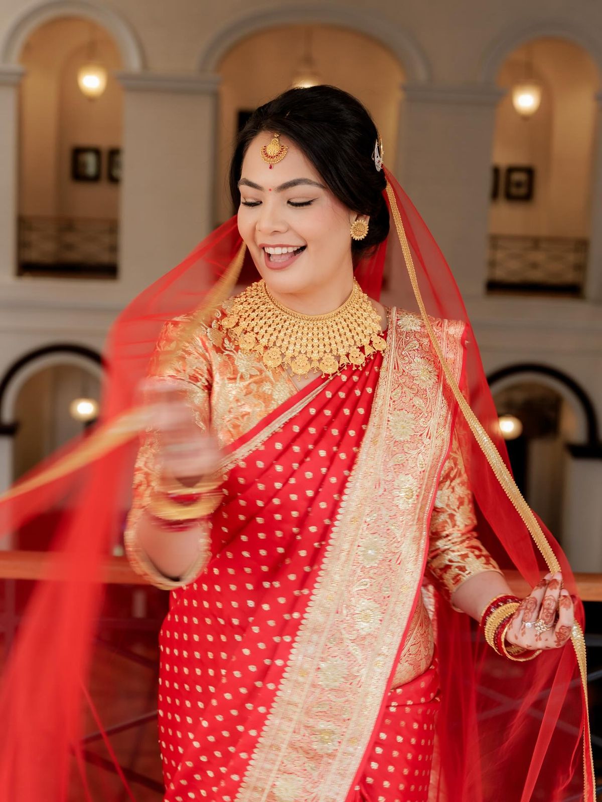 Ushma in her grandmother’s red Benarasi saree